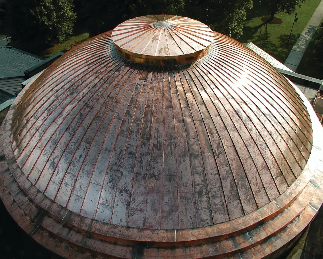 Craftsman Roofing crew installing a new roof in Monroe